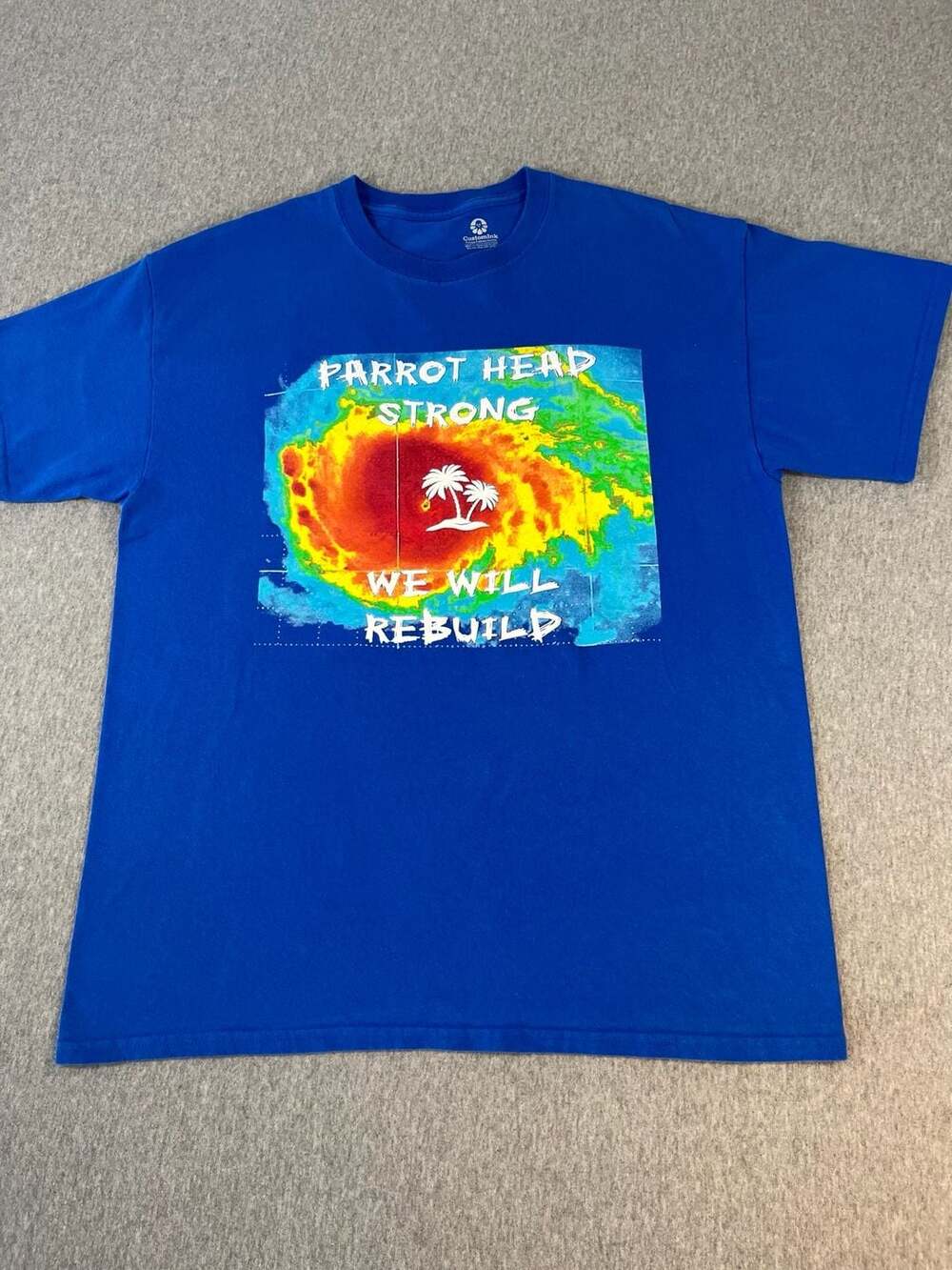 CustomInk Parrot Head Strong We Will Rebuild Blue T Shirt Men Large